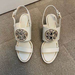 Tory Burch Cream Wedges with Gold Emblem
